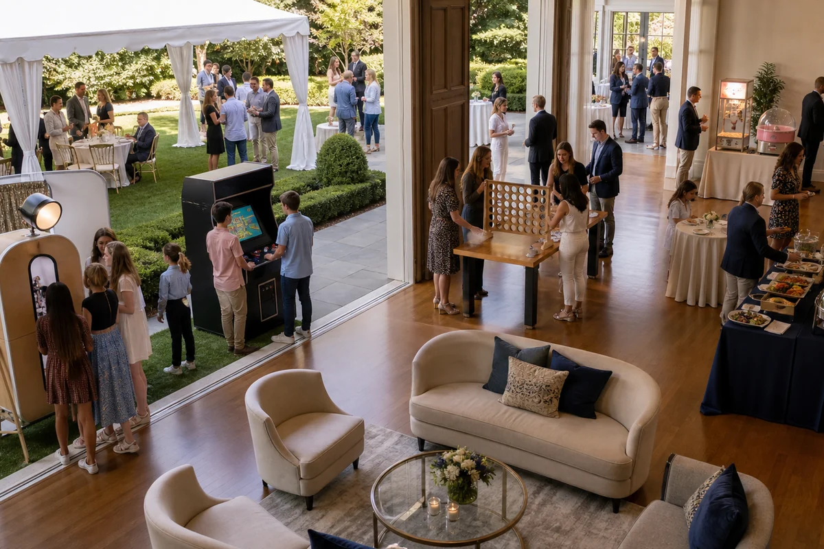 In practical terms, main Line party rental layout with photo booth, arcade station, lounge seating, concessions, activity tables, and clear walking lanes