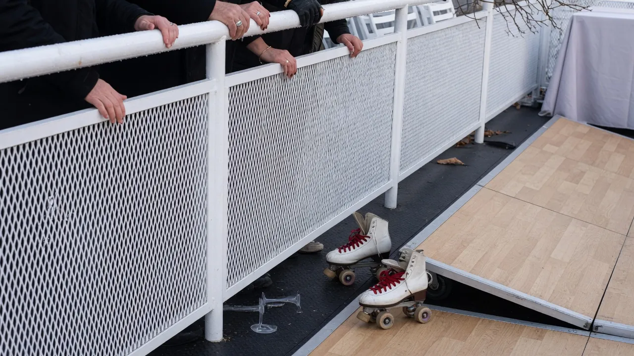 Spectators watching a weather-aware roller skating event