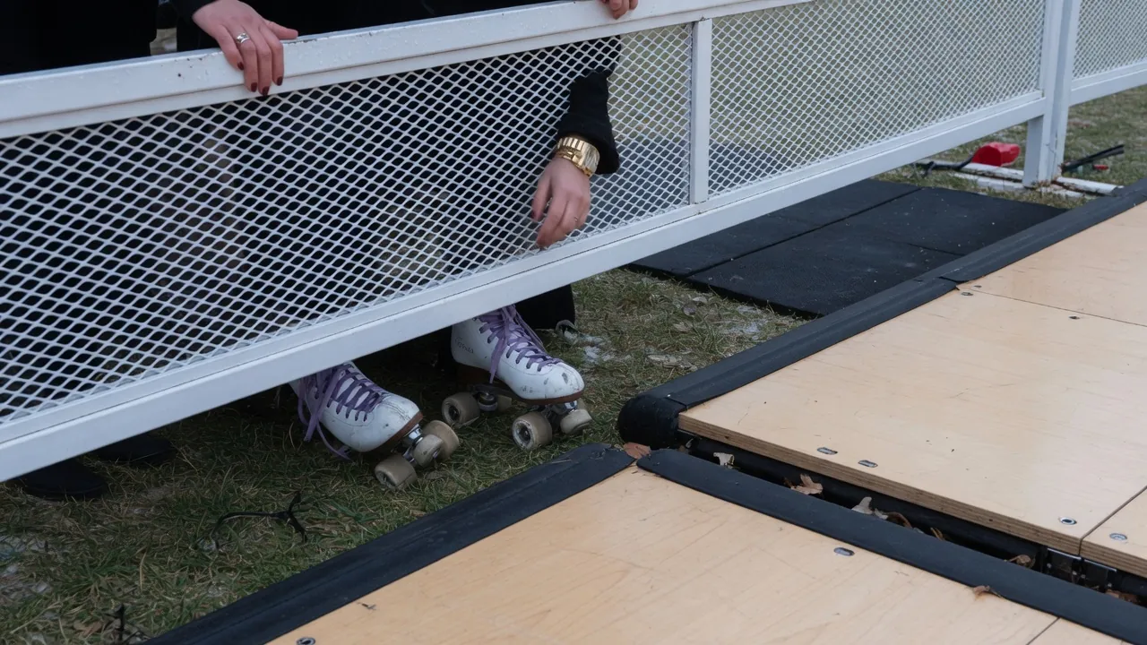 Editorial photo of event fencing on a Ithaca-style pad; not a specific venue