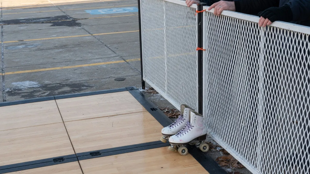 Editorial photo of event fencing and a guest path on a Pittsburgh-style pad; not a specific venue