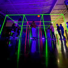 Glow party rental East Coast: neon 9 square in the air
