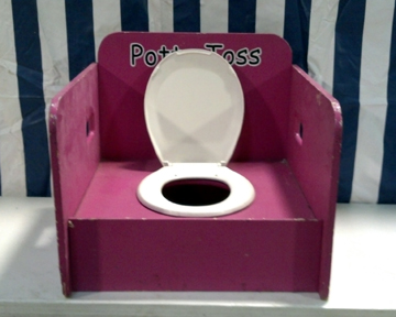 Potty Toss carnival game with booth and tent rental in Philadelphia PA
